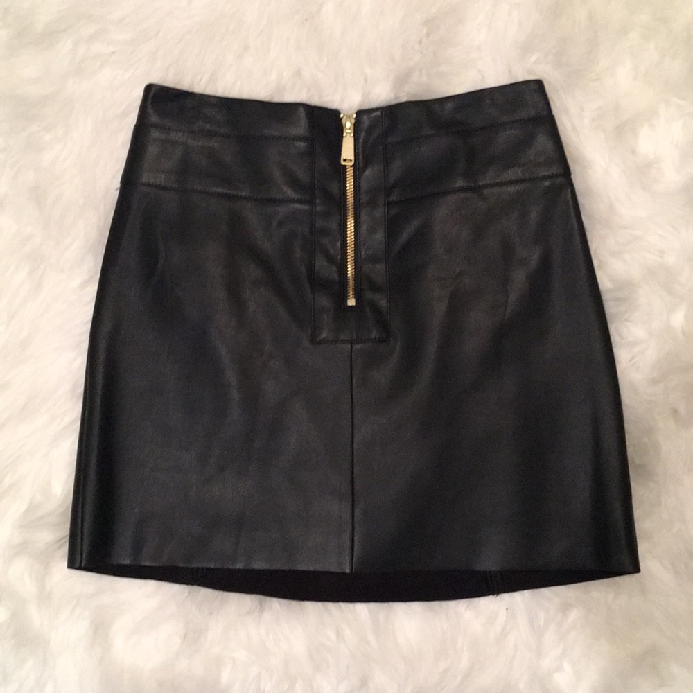 Black leather mini skirt